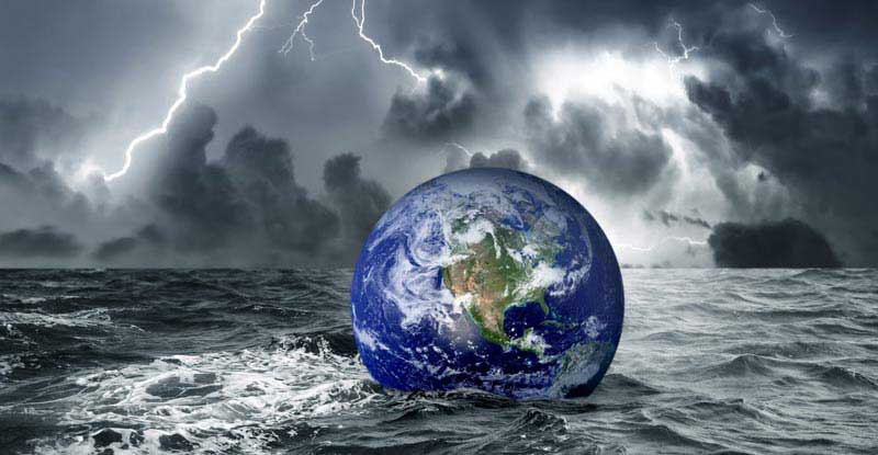 Globe floating in rough waters of the ocean with lightning